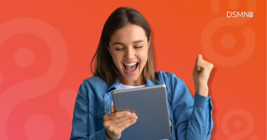 Woman looking happy reading a newsletter on her ipad