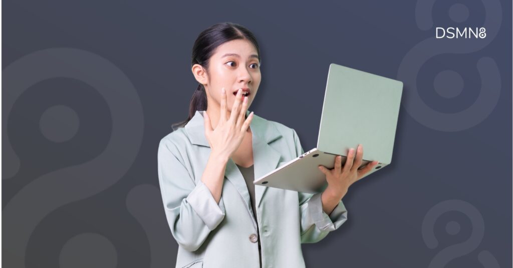 employee looking at laptop