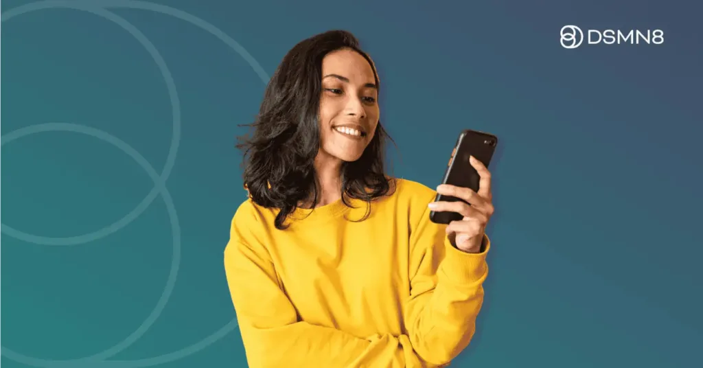 happy employee looking at phone